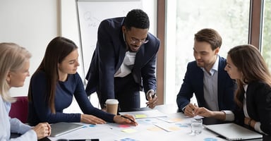 Business professionals meeting gathered around table